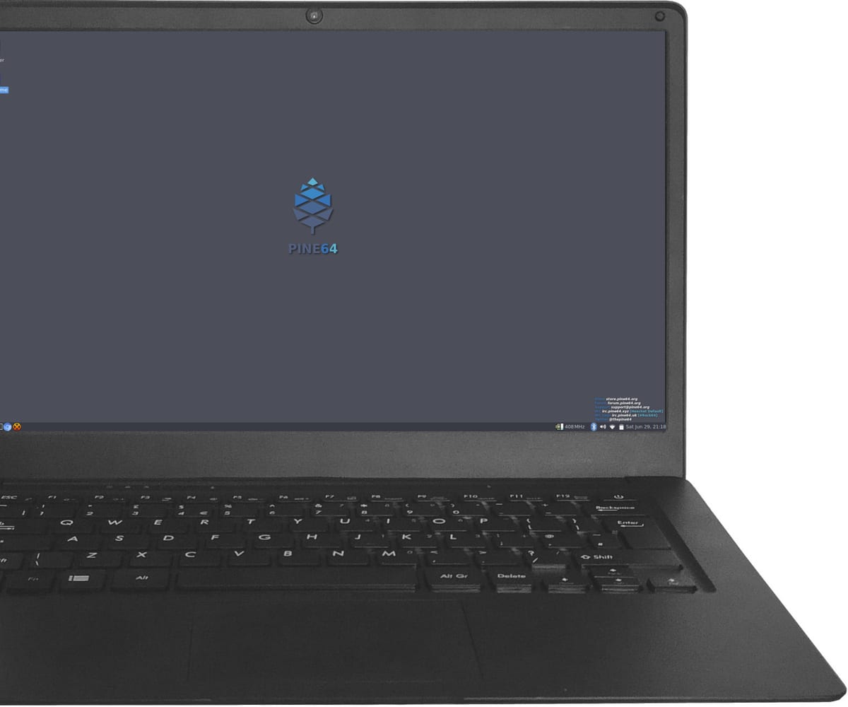 A thin black laptop open on a white background, viewed from the front with the keyboard and trackpad in view.